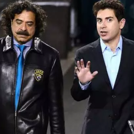 Shahid and his son Tony talking in a conference